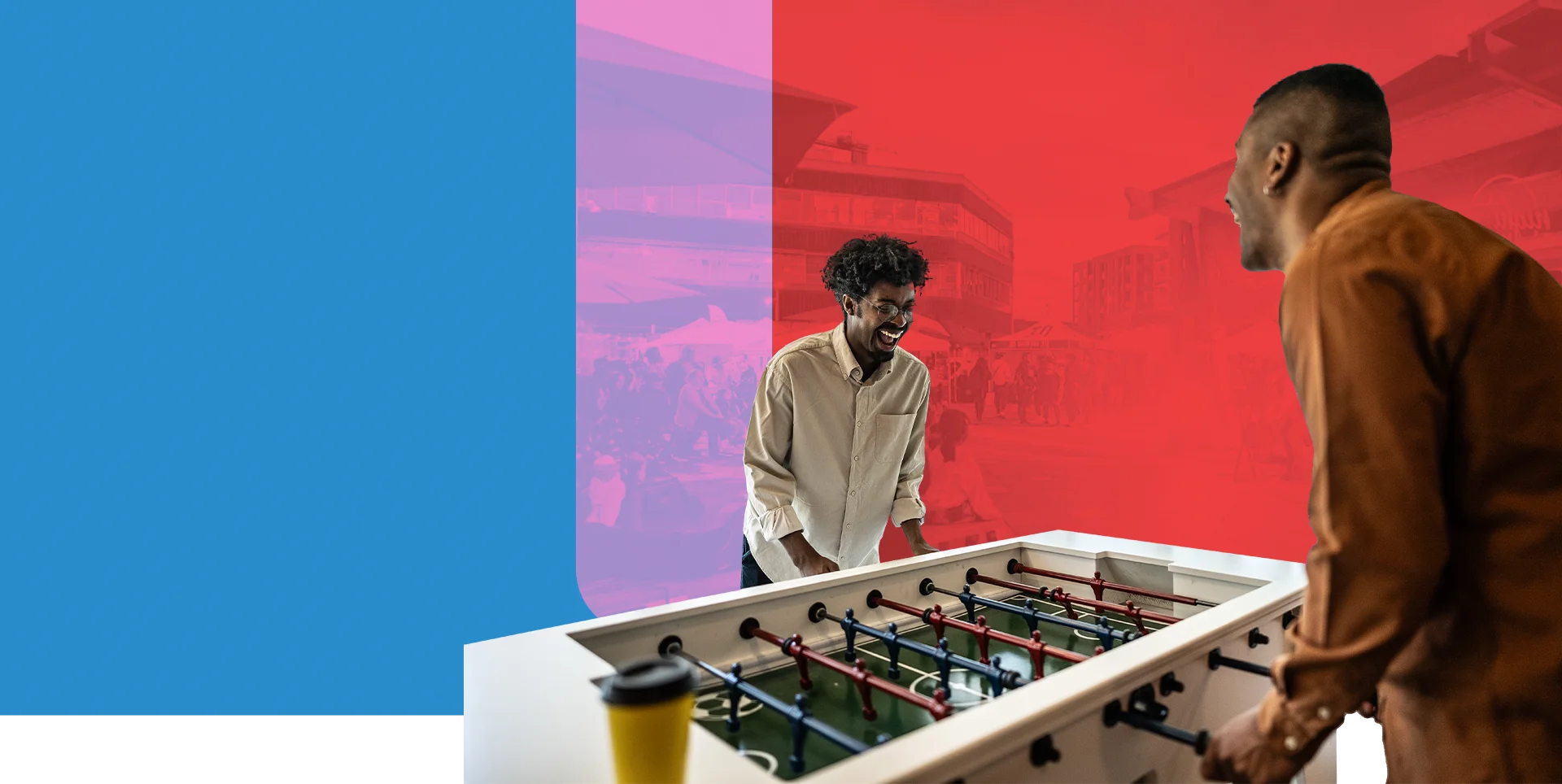 FRIENDS PLAYING FOOSEBALL